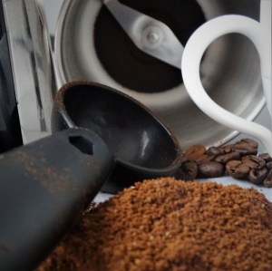 coofee grinder, coffee beans, ground coffee, cup handle