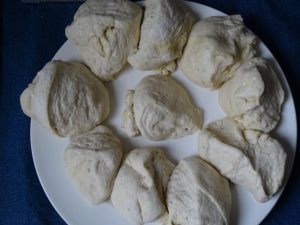 Flat bread dough balls. plate
