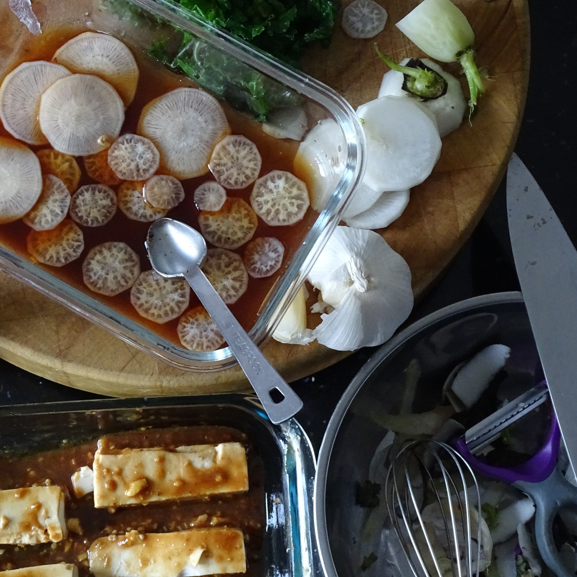 chopping board, knife vegetable, trimmings, garlic, radish