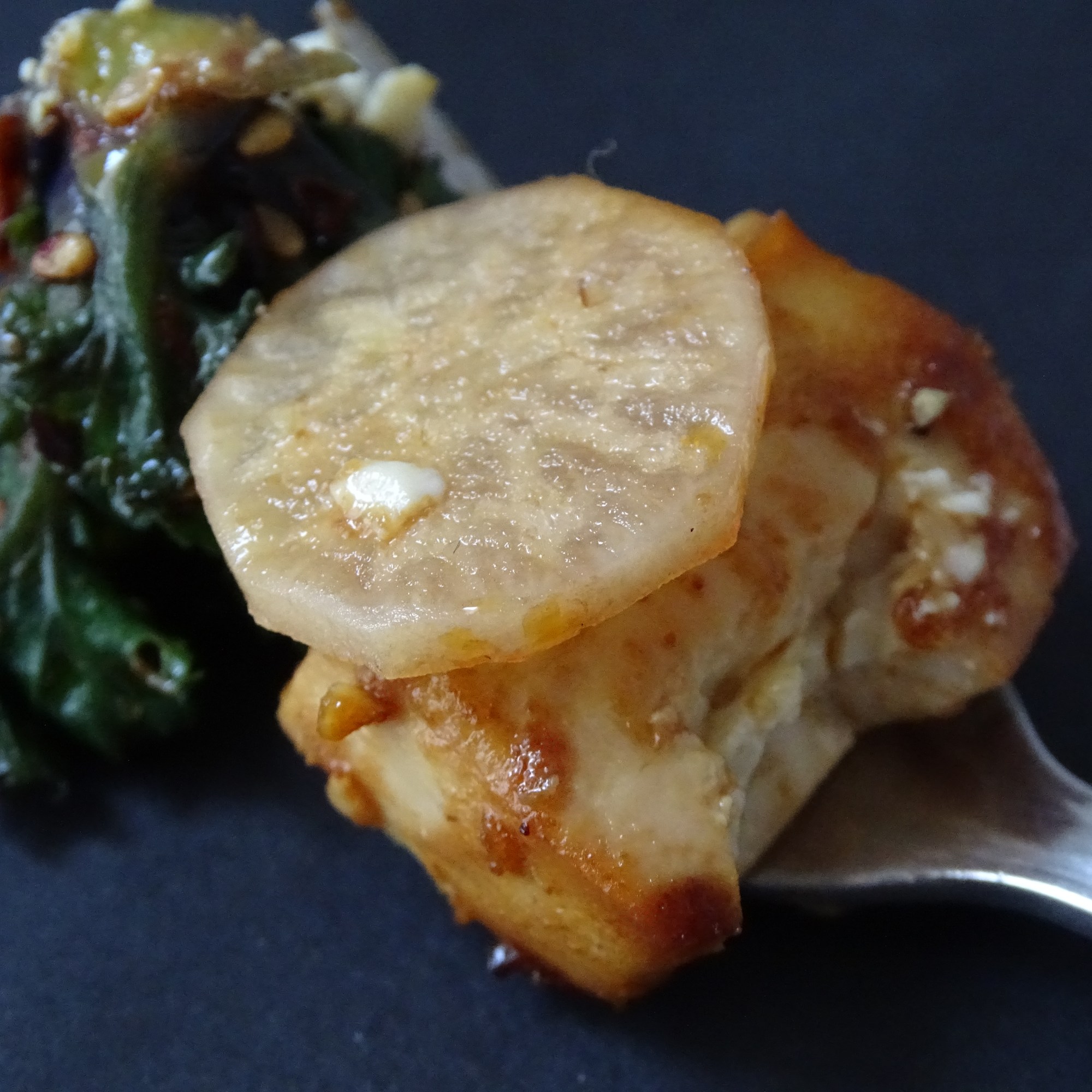 tofu, flower sprouts, radish, fork