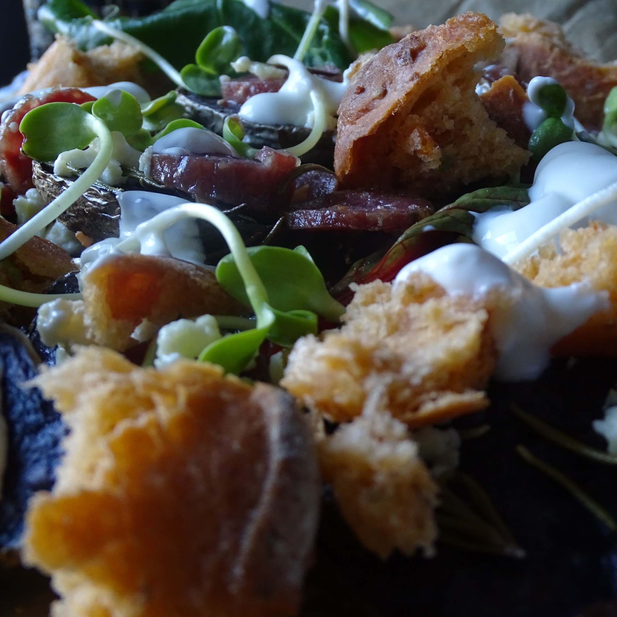 Roasted Purple Potatoes, Wooded Pig Garlic Salami, Greens, Feta & Greek Yogurt