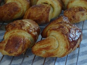 Croissants, cooling on rack