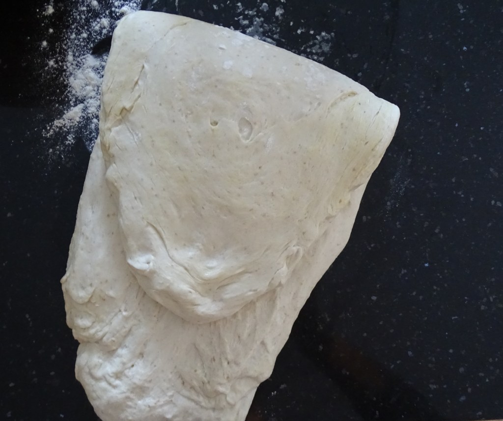 Food Photography, folding the sourdough