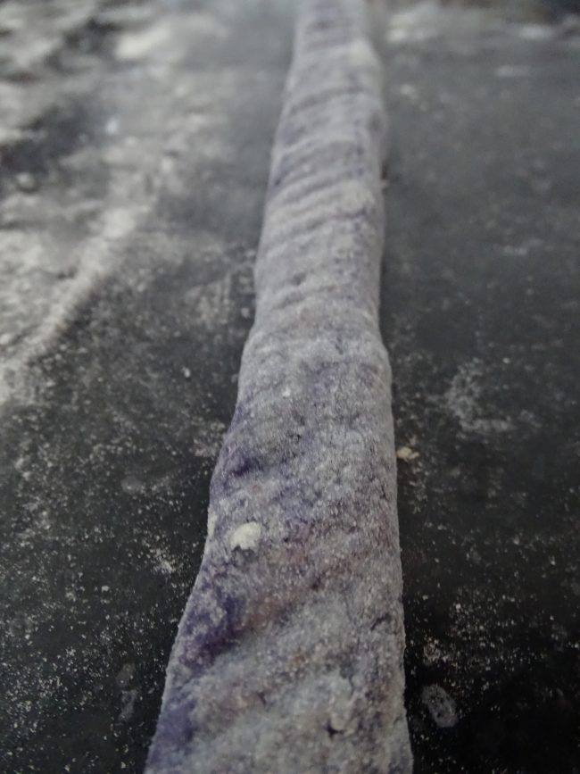 Rolling out the dough for Anneliese blue potato gnocchi