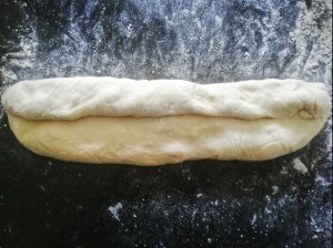 Shaping the dough for baguettes