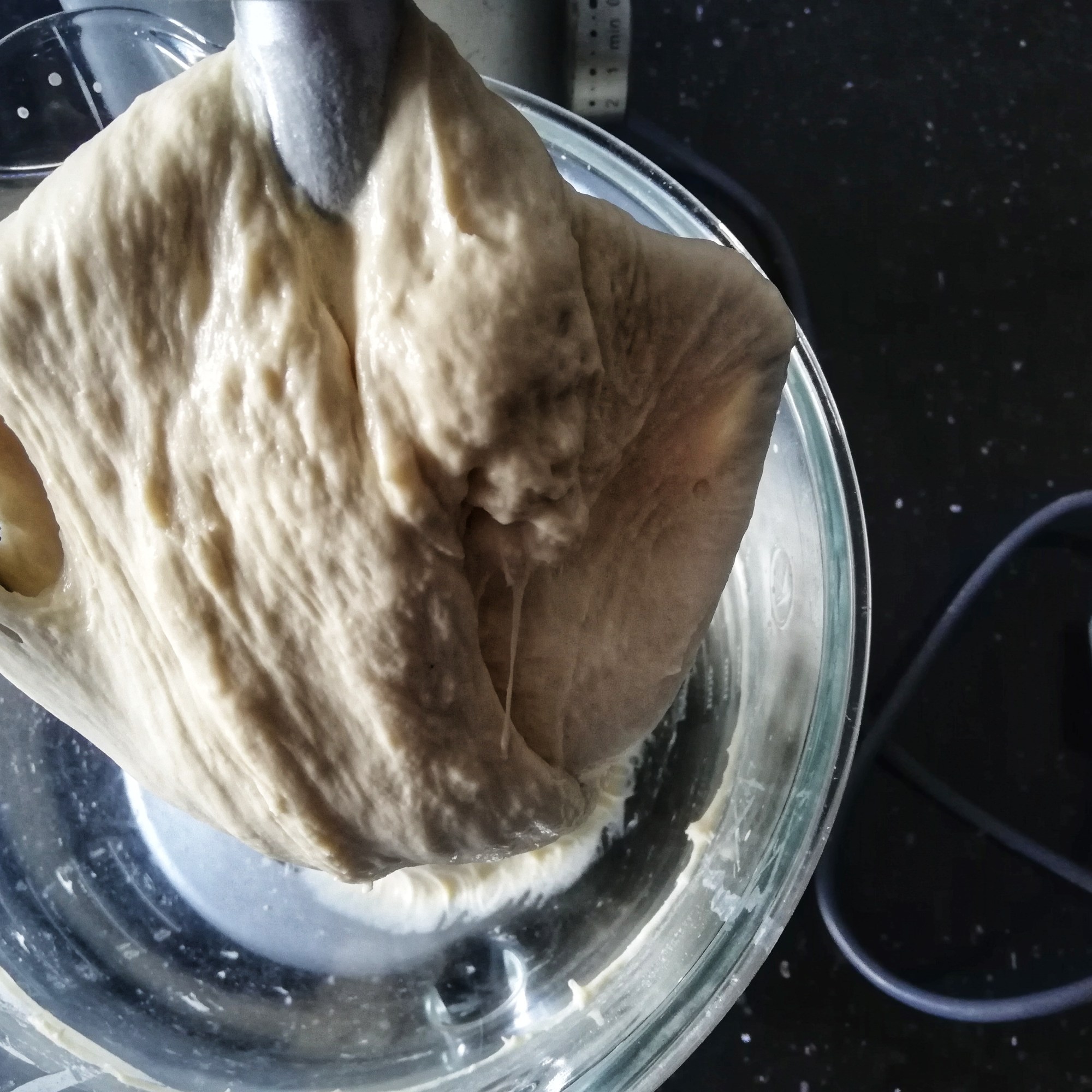 Ciabatta dough after a further six minutes mixing, smooth, shiny,