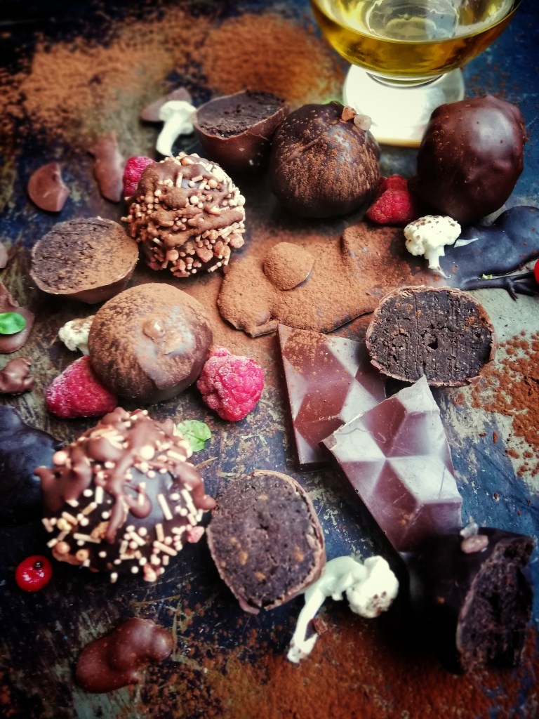Food photography,chocolate, Irish whiskey, cauliflower truffles, glass whiskey, Cocoa powder