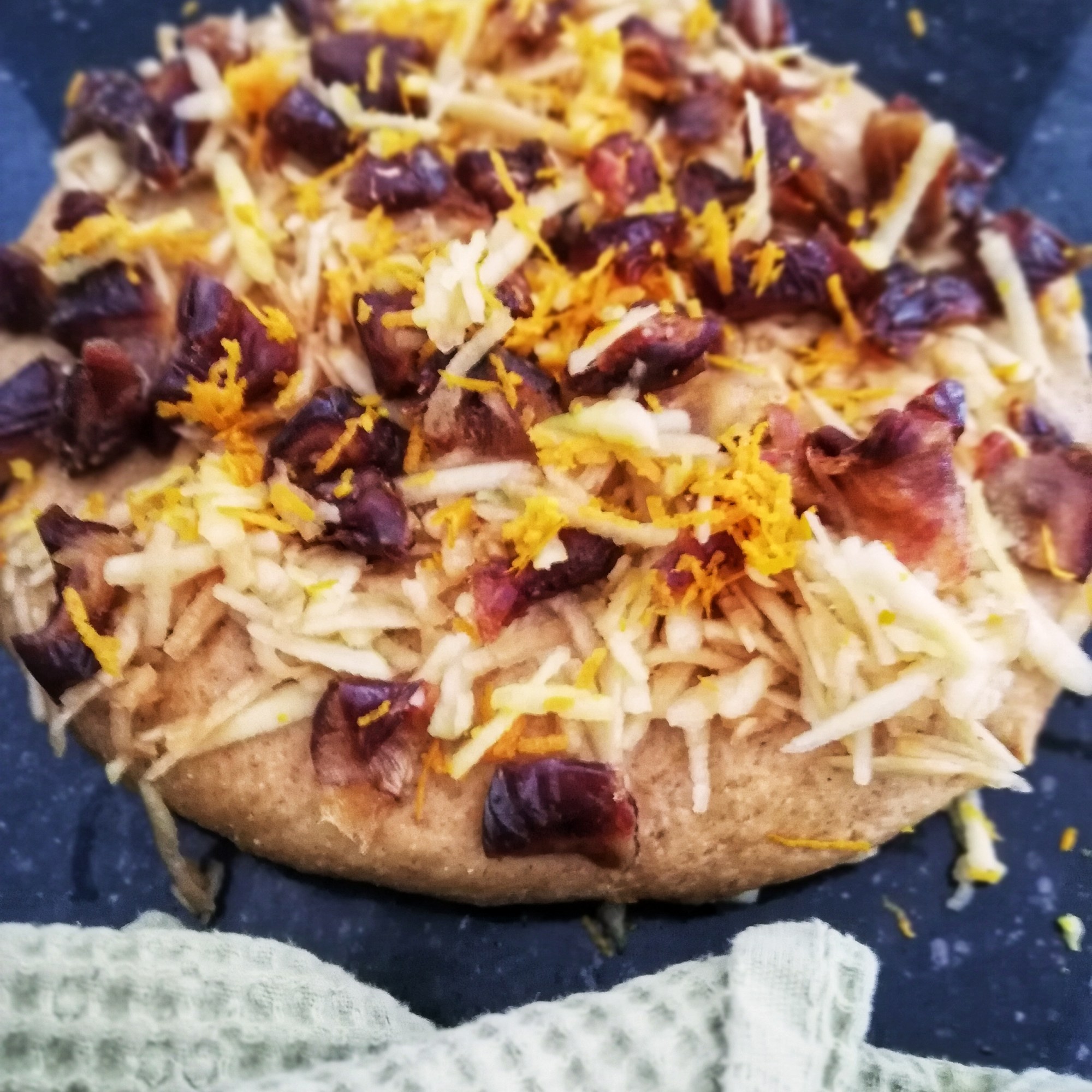 Food photography, mixing in the dates, apple & orange zest hot cross bun dough