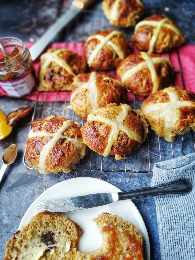 Food photography,apple, date & orange zest hot cross buns,plum jam, butter knife