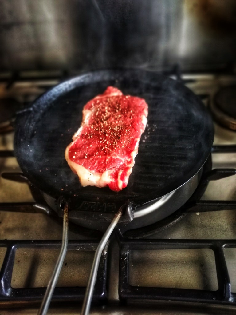 Griddling the steak, stove, griddle pan