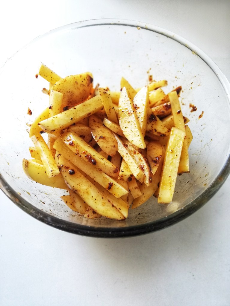 Prepping the potato for fries