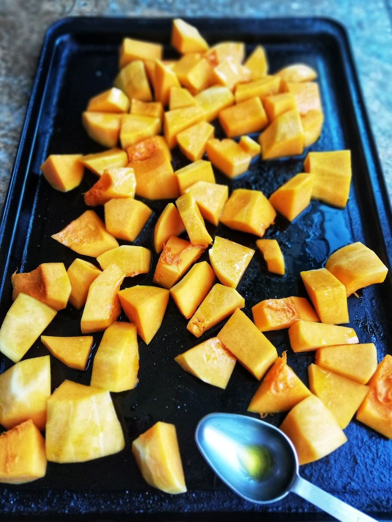 Food photography, Chopped butternut squash, baking tray, table spoon
