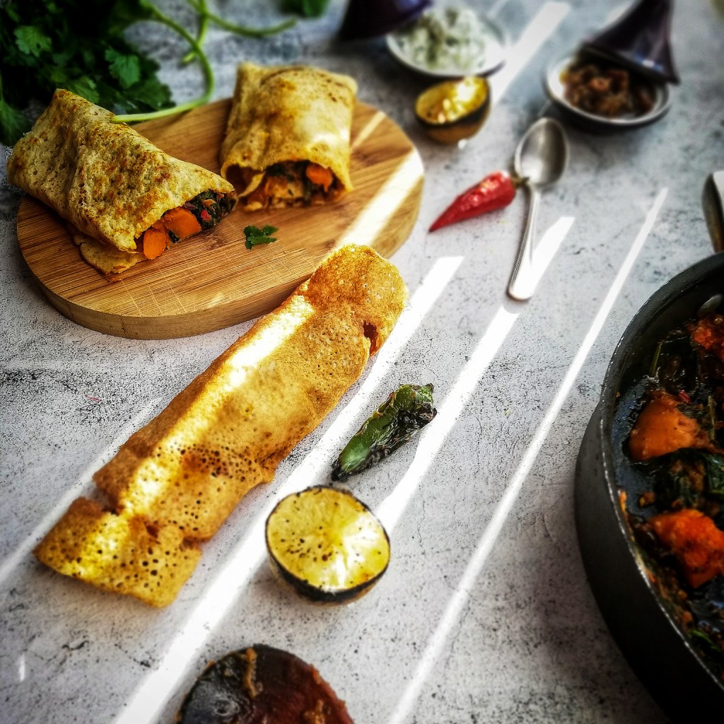 Dosa, Indian rice pancake with masala squash, lime, chilli sauce pan