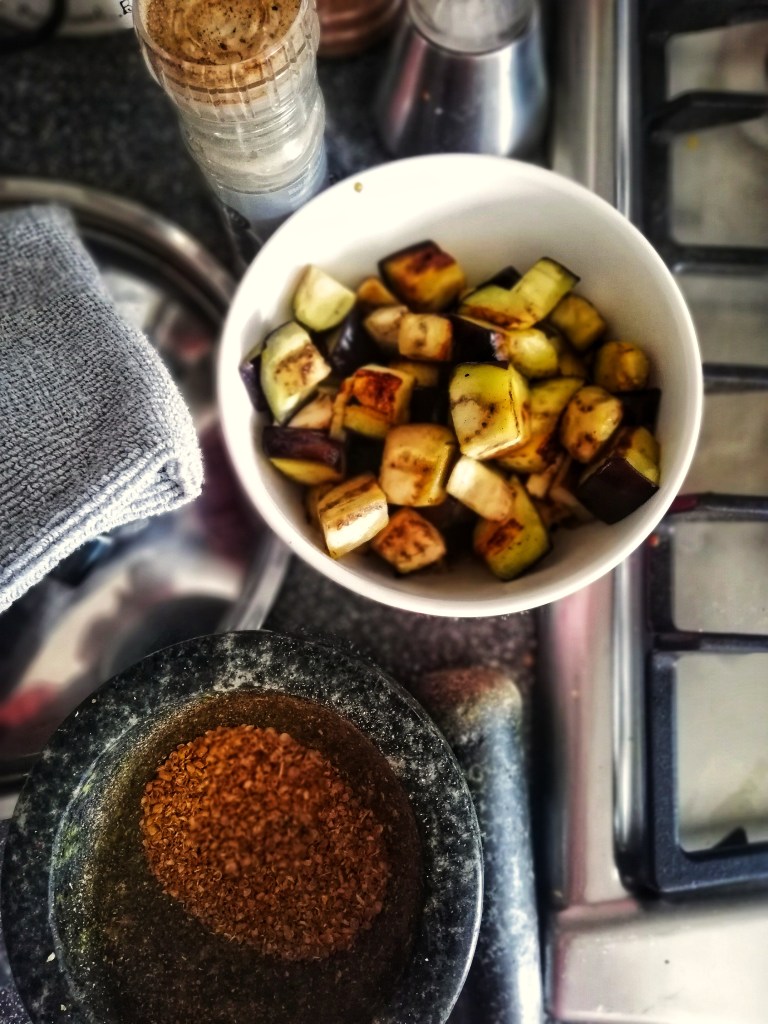 Food photography, bowl of Sauteed aubergine for chilli