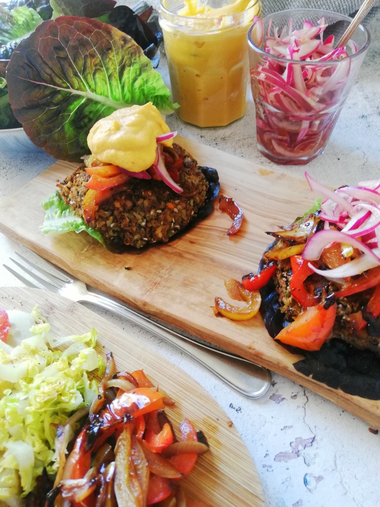 Black bean, freekeh & yellow split pea burger, lettuce, butternut squash dressing.