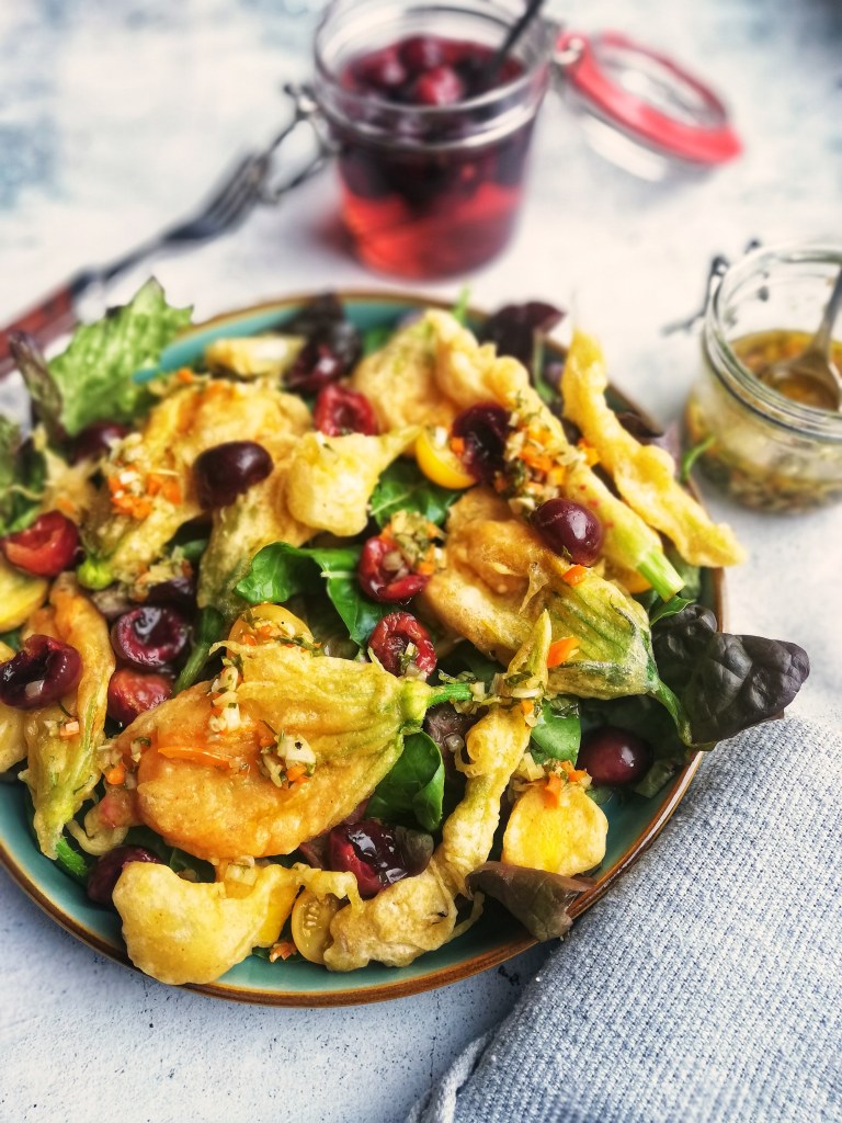 Tempura squash flowers,wet garlic pickled cherries leaves & her vinaigrette