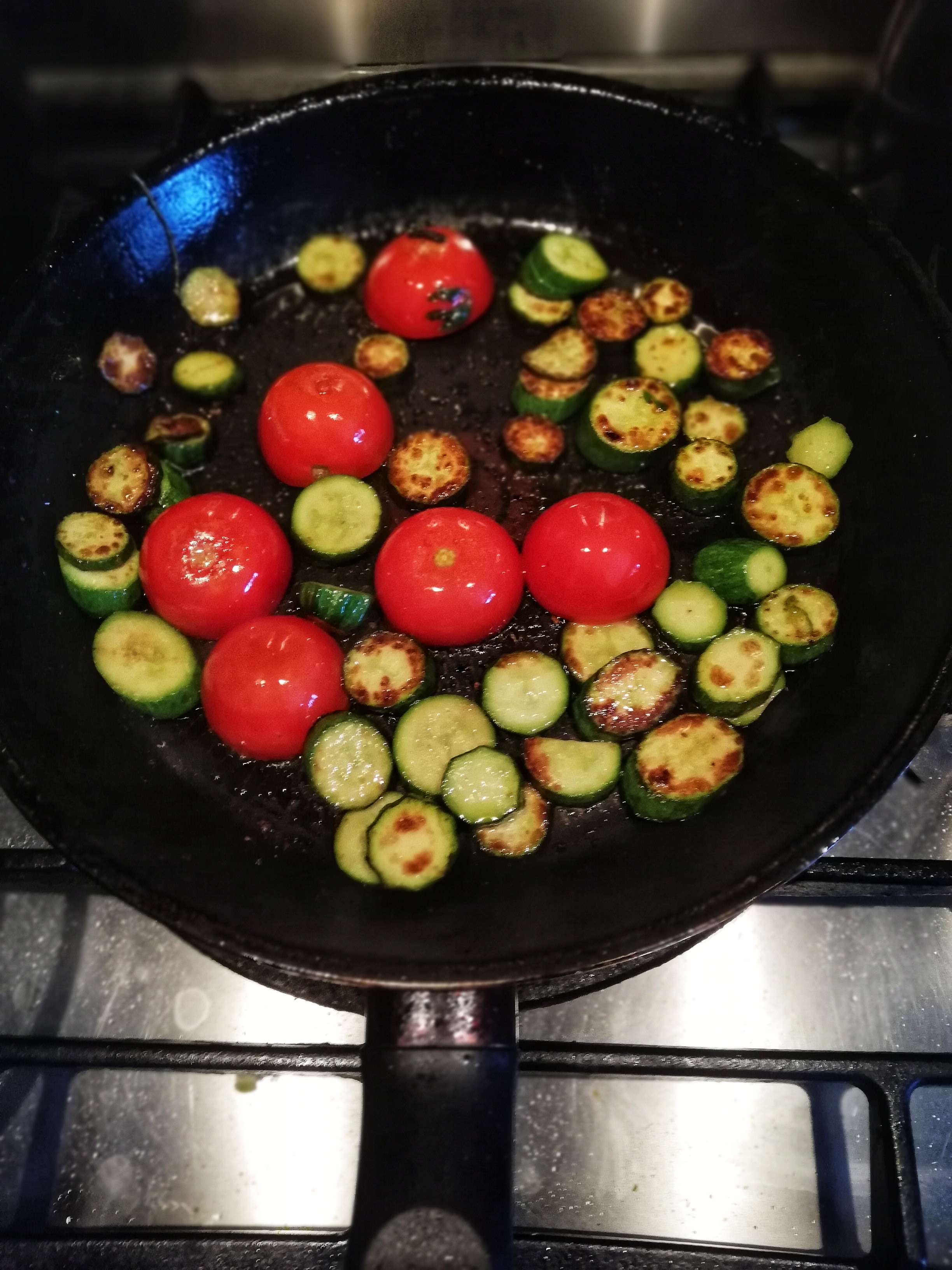 Image, Sauteing baby courgettes and cherry tomatoes in pan