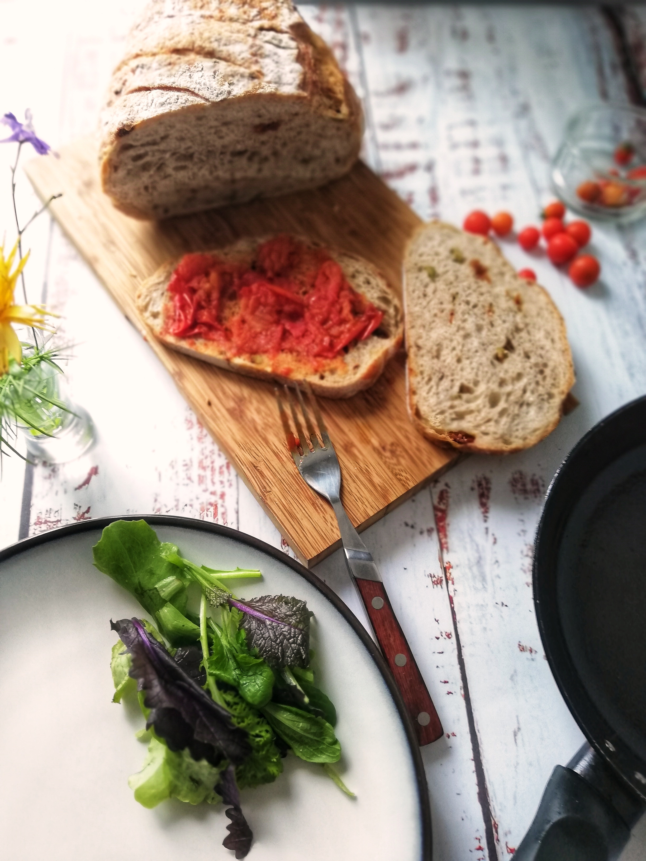 Image, Mashing the tomatoes on the sourdough