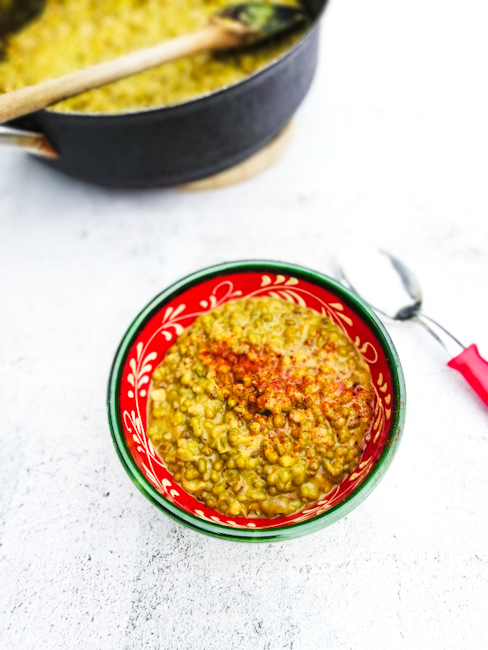 Image,Bowl of Mung bean Dahl, saucepan in background
